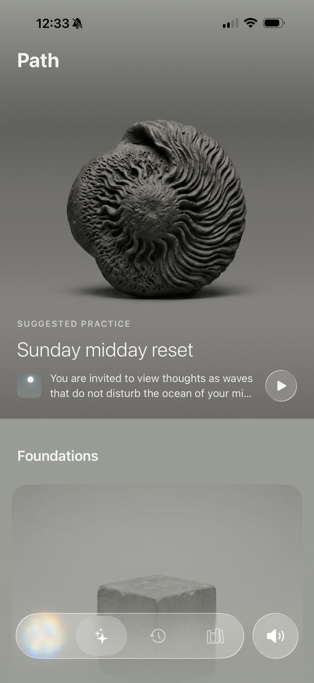 The Sacred Act Path screen with a sculptural fossil, a suggested practice, and a clear play control.